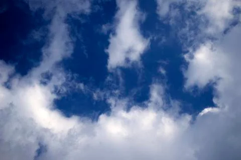 Blue sky background with white clouds Foto stock