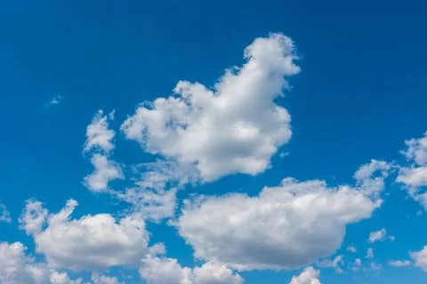Blue sky background with white clouds Stock Photos