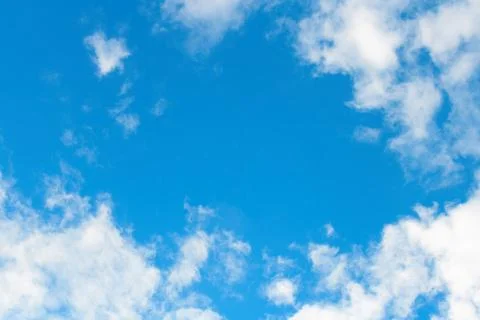 Blue sky background with white clouds Stock Photos