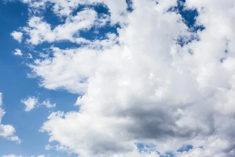 Blue sky background with white clouds Stock Photos