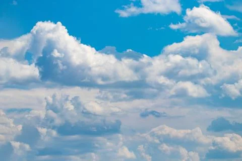 Blue sky background with white clouds. close up Stock Photos