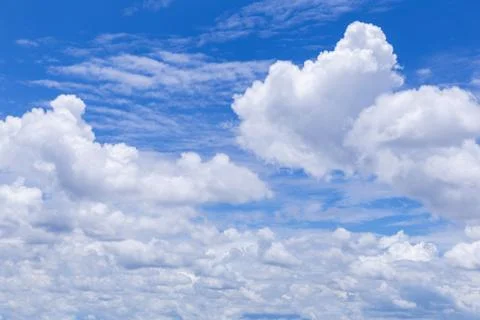 Blue sky background with white clouds, rain clouds. Foto stock