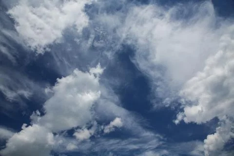Blue sky background with white clouds Stock Photos