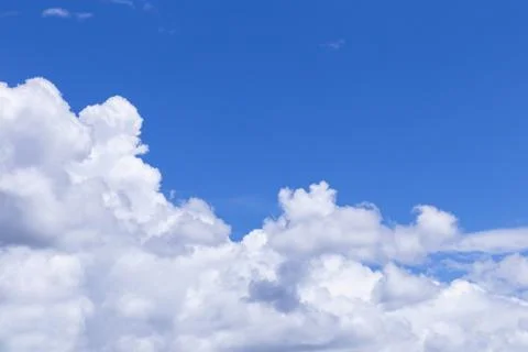 Blue sky background with white clouds, rain clouds. Foto stock
