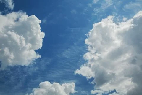 Blue sky background with white clouds Stock Photos