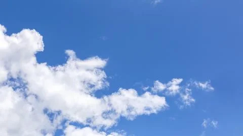 Blue sky background with white clouds, rain clouds on summer or spring day. Fotos de archivo