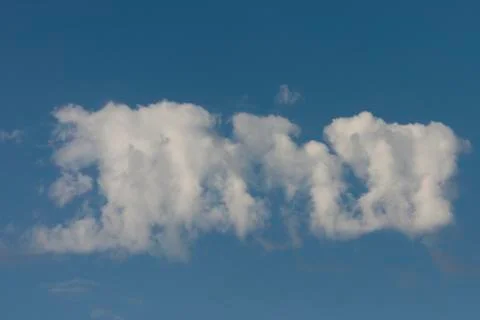 Blue sky background with white clouds closeup Stock Photos