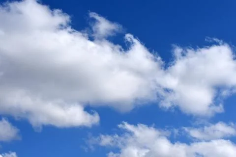 Blue sky background with white clouds Stock Photos