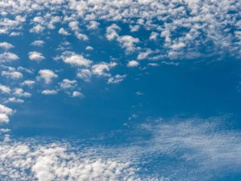 Blue sky background with white clouds. Stock Photos