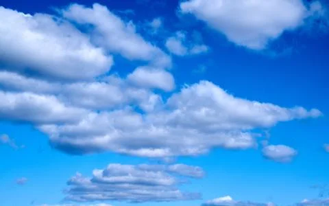 Blue sky background with white clouds Fotos Stock