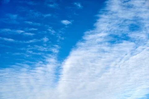 Blue sky background with white clouds Stock Photos