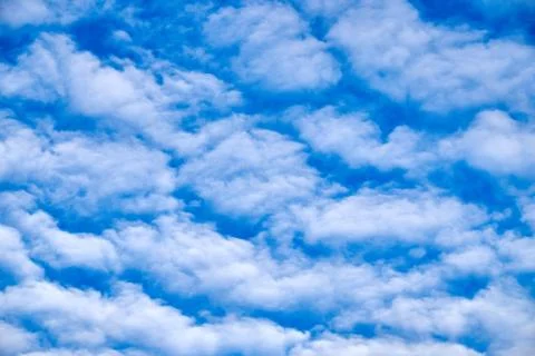Blue sky background with white clouds Stock Photos