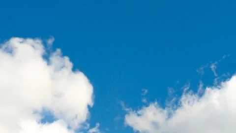 Blue sky background with white clouds. Stock Photos