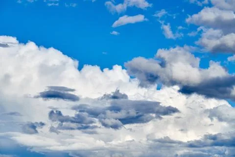 Blue sky background with white clouds Stock Photos