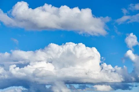 Blue sky background with white clouds Stock Photos