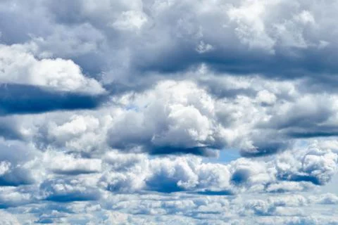 Blue sky background with white clouds Stock Photos