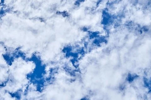 Blue sky background with white clouds Stock Photos