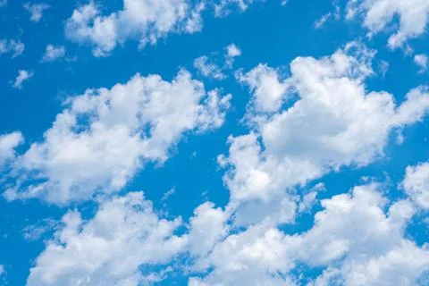 Blue sky background with white clouds, texture Stock-Fotos