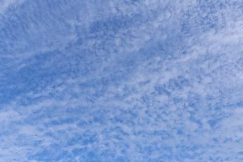 Blue sky background with white clouds on sunny day. Foto stock