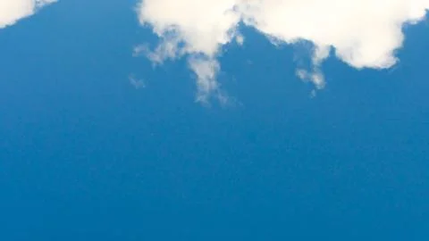 Blue sky background with white clouds. Stock Photos