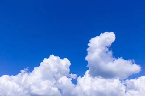 Blue sky background with white clouds on sunny day. 写真素材