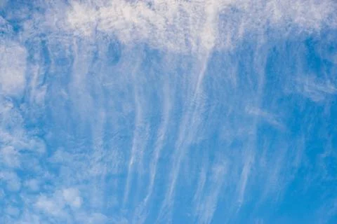 A blue sky background with white clouds Stock Photos