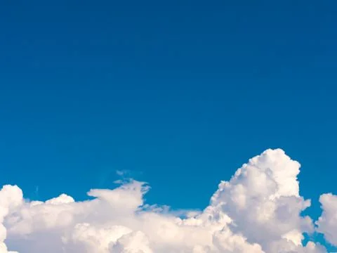 Blue sky background with white clouds. Stock Photos
