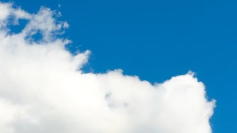 Blue sky background with white clouds. Stock Photos