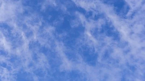 Blue sky background with white clouds on sunny day. Foto stock