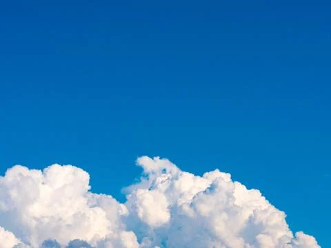 Blue sky background with white clouds. Stock Photos