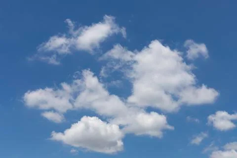Blue sky background with white clouds Stock Photos