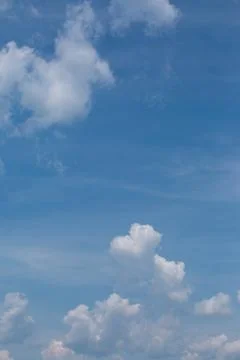 Blue sky background with white clouds Stock Photos