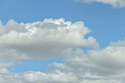Blue sky background with white clouds sun Stock Photos