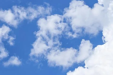 Blue sky background with white clouds sun Stock Photos
