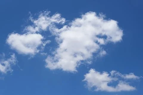 Blue sky background with white clouds closeup Foto stock