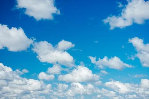 Blue sky background with white clouds. 写真素材