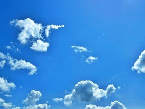 Blue sky background with white clouds. international climate day. Wind Day. W Stock-Fotos