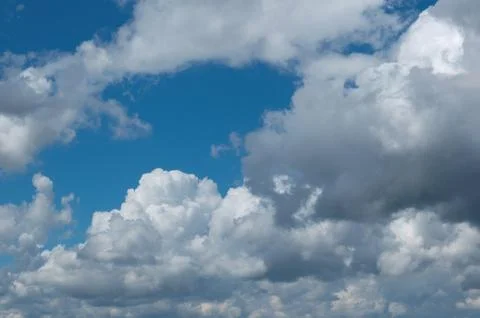 Blue sky background with white clouds Stock Photos