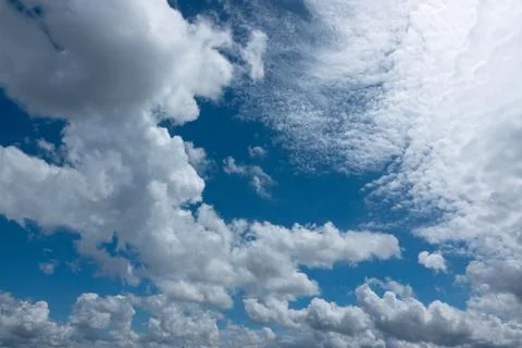 Blue sky background with white clouds Stock Photos