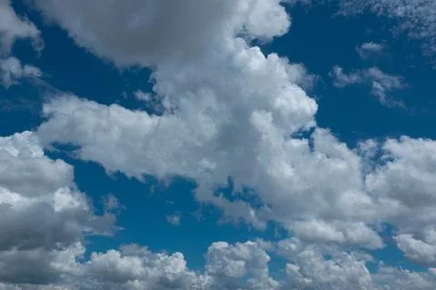 Blue sky background with white clouds Stock Photos