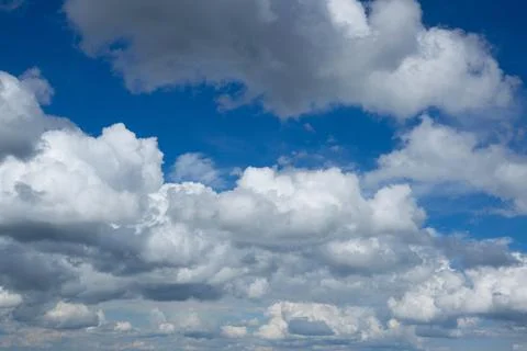 Blue sky background with white clouds Stock Photos