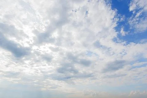 Blue sky background with white clouds cumulus floating soft focus.. Stock Photos