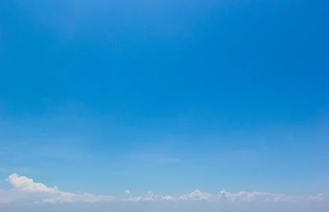 Blue sky background with white clouds cumulus floating soft focus, copy space Stock Photos