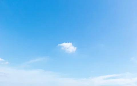 Blue sky background with white clouds cumulus floating soft focus. Stock Photos