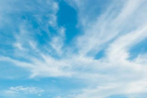 Blue sky background with white clouds cumulus floating soft focus, copy space Stock Photos