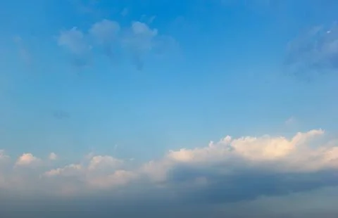 Blue sky background with white clouds cumulus floating soft focus, copy space Stock Photos