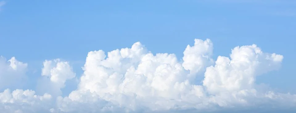 Blue sky background with white clouds Stock Photos