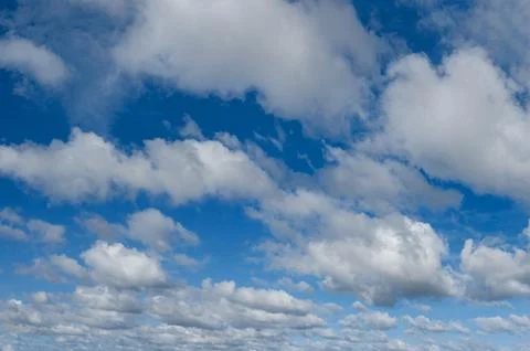 Blue sky background with white clouds Stock Photos
