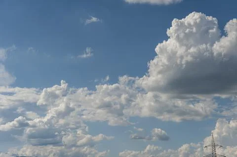 Blue sky background with white clouds. Stock Photos