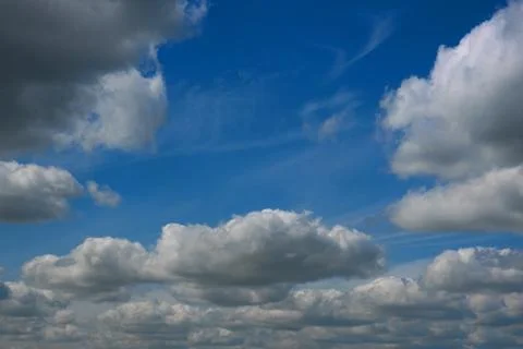 Blue sky background with white clouds Stock Photos